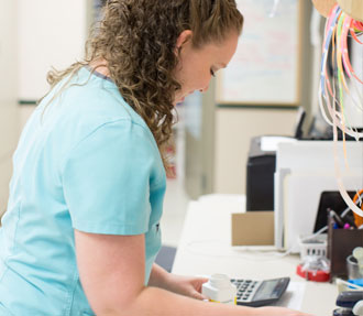 Staff selecting medicine